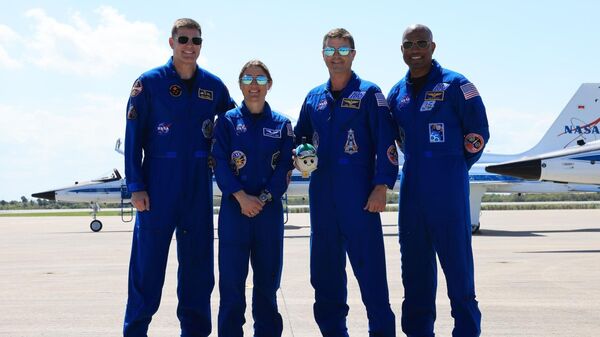 From left to right, Artemis II Mission Specialist Jeremy Hansen from the CSA (Canadian Space Agency), Mission Specialist Christina Koch, Commander Reid Wiseman, and Pilot Victor Glover