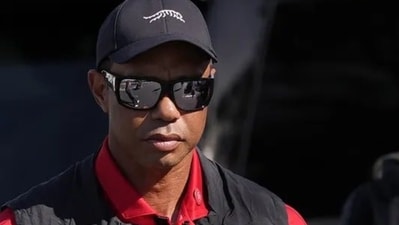 Tiger Woods faces DUI charges and has opted against using a driver for privacy. Following his arrest in Florida, he was released after eight hours. (X/@NUCLRGOLF)