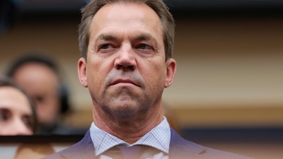 Kristi Noem's husband Bryon faces scandalous claims of living as a crossdresser, engaging with adult entertainers online. (Getty Images via AFP)