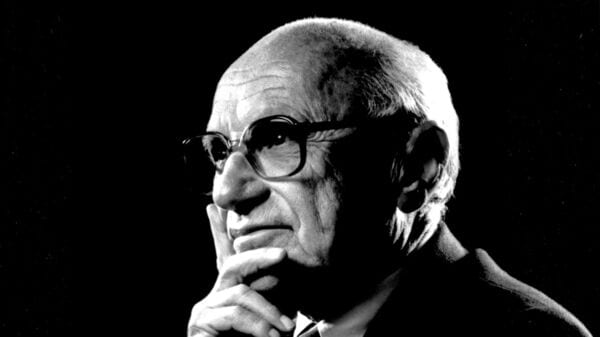 Milton Friedman poses in this undated handout photo. Source: PBS via Bloomberg News.