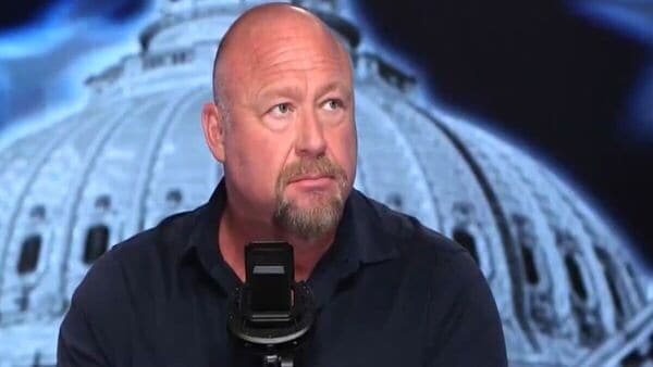 Alex Jones escalated with a direct warning: “If you think I’ve been coming after you… say one more thing… then I’m gonna show you how the cow ate the cabbage.”