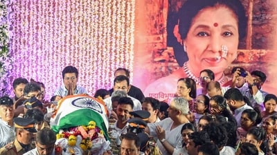 The Tricolour-draped mortal remains of Asha Bhosle during her state funeral in Mumbai on Monday, April 13. (ANI Photo)