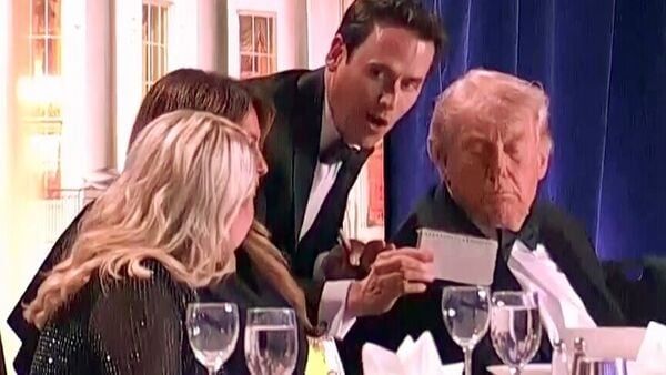 US President Donald Trump at the White House Correspondents' Dinner before shots were reportedly fired at the event, in Washington, D.C., on Saturday. (Reuters/ANI Video Grab)