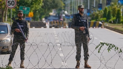 Soldiers stand guard at a checkpoint to ensure security ahead of the possible negotiations between the United States and Iran in the Pakistani capital, Islamabad, Pakistan, Friday, April 10, 2026. (AP)