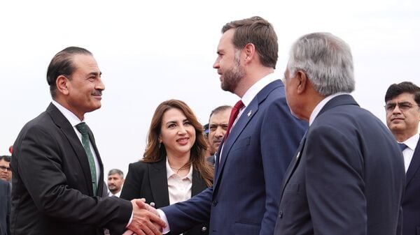 U.S. Vice President JD Vance, center, shakes hands with Pakistan's Chief of Defence Forces and Chief of Army Staff Field Marshall Asim Munir, left, as Charge d'Affaires of the U.S. Embassy in Islamabad Natalie A. Baker, second left, and Pakistani Deputy Prime Minister and Foreign Minister Mohammad Ishaq Dar, right look on, after arriving for talks with Iranian officials in Islamabad, Pakistan, Saturday, April 11, 2026. AP/PTI(AP04_11_2026_000132B)
