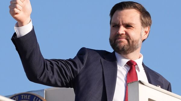 Vice President JD Vance gives a thumb up sign as he boards Air Force Two after attending talks on Iran in Islamabad, Pakistan, Sunday, April 12, 2026. AP/PTI