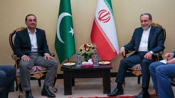 Iranian Foreign Minister Abbas Araghchi, right, meets with Pakistan's Army Chief Field Marshal Gen. Asim Munir in Tehran