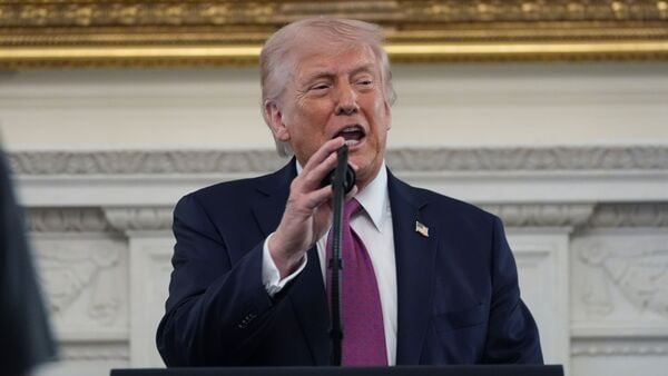 US President Donald Trump said Iran is under severe economic strain due to its inability to export oil. (in pic: Trump speaks during an event for NCAA national champions in the State Dining Room of the White House, Tuesday, April 21, 2026, in Washington. AP/PTI)