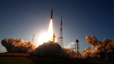 NASA's Artemis II mission to fly by the moon, comprising of the Space Launch System (SLS) rocket with the Orion crew capsule, lifts off (REUTERS)