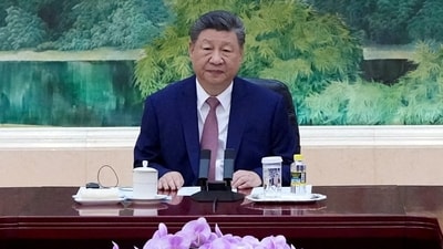 China’s President Xi Jinping attends a meeting with Russia’s Foreign Minister Sergei Lavrov (not pictured) at the Great Hall of the People in Beijing. (via REUTERS)