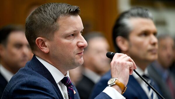 Jules Hurst, acting comptroller of the Pentagon, left, and Pete Hegseth, US secretary of defense, during a House Armed Services Committee hearing in Washington, DC, US, on Wednesday, April 29, 2026. Photographer: Daniel Heuer/Bloomberg
