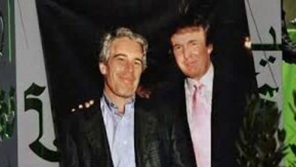 Trump and Epstein videos projected on Washington hotel building (Image: Reuters)