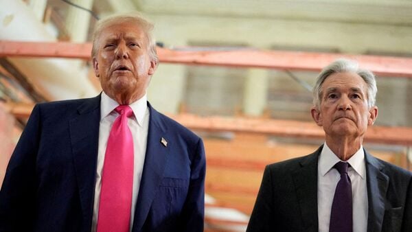 US President Donald Trump and Federal Reserve Chair Jerome Powell speak during a tour of the Federal Reserve Board building, July 24, 2025.