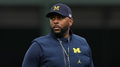 Sherrone Moore, ex-Michigan football coach, is set for sentencing following a no contest plea to charges of inappropriate conduct with a staff member, which led to his firing. (Getty Images via AFP)