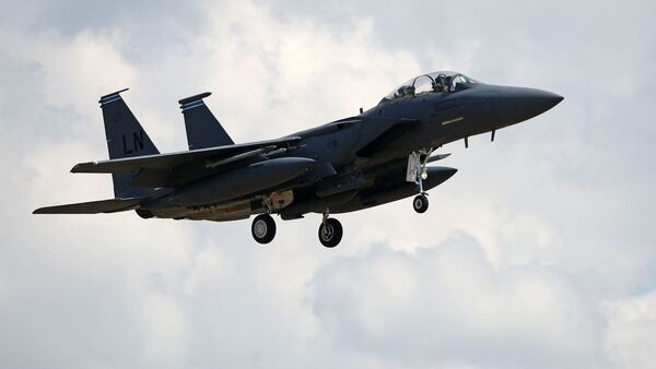 A US Air Force F-15E Eagle fighter jet, is pictured as it prepares to land at RAF (Royal Air Force) Lakenheath, east of England, on June 15, 2020.
