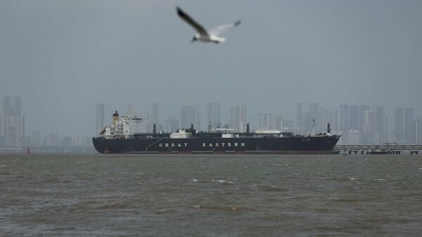 FILE PHOTO: A bird flies near the Jag Vasant vessel transferring LPG at a port after transiting the Strait of Hormuz amid supply disruptions linked to the U.S-Israeli conflict with Iran, in Mumbai, India, April 1, 2026. REUTERS/Francis Mascarenhas/File Photo