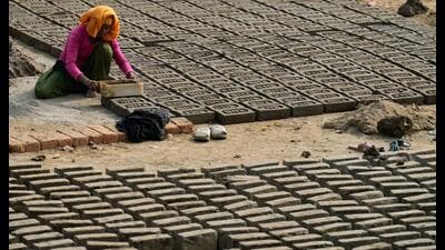 India was among the early adopters of statutory minimum wages, introducing the Minimum Wages Act in 1948, empowering states to set wage floors for selected “scheduled employments” with weak bargaining power, such as agriculture, construction, brick kilns, bakeries, automobile workshops, and others. (AP)