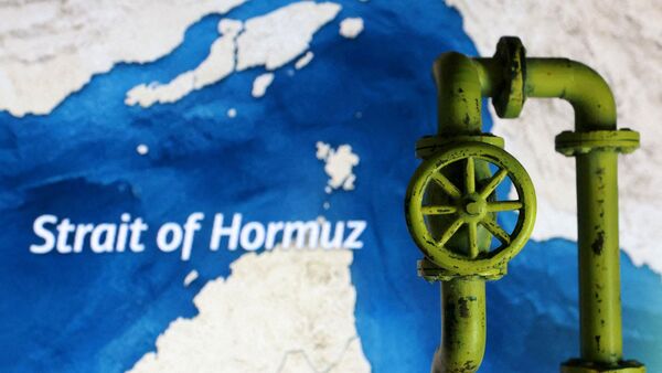 FILE PHOTO: FILE PHOTO: A map showing the Strait of Hormuz and a 3D printed oil pipeline are seen in this illustration taken March 23, 2026. REUTERS/Dado Ruvic/Illustration/File Photo/File Photo