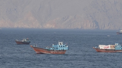 Ships and tankers in the Strait of Hormuz off the coast of Musandam, Oman. (REUTERS)