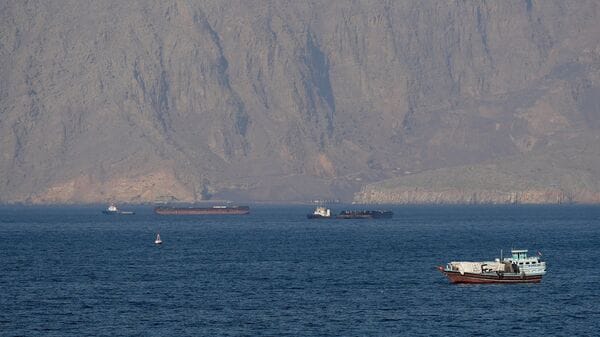 Iran US War LIVE: Ships and tankers in the Strait of Hormuz off the coast of Musandam, Oman, April 18, 2026. REUTERS/Stringer REFILE - QUALITY REPEAT     TPX IMAGES OF THE DAY