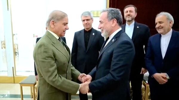 Iranian Foreign Minister Abbas Araqchi meets Pakistani Prime Minister Shehbaz Sharif, in Islamabad, Pakistan.