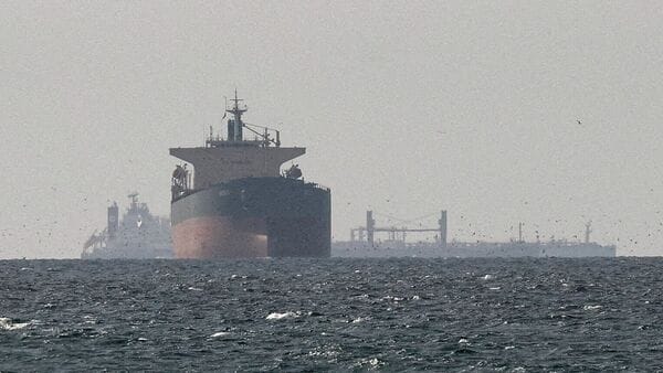 Cargo ships in the Gulf, near the Strait of Hormuz, as seen from northern Ras al-Khaimah, near the border with Oman’s Musandam governance, amid the U.S.-Israeli conflict with Iran, in United Arab Emirates (Reuters)