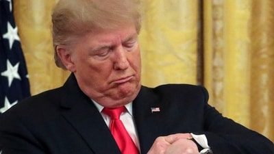 US. President Donald Trump checks his watch during an event at the White House in Washington, D.C., U.S., (REUTERS File)