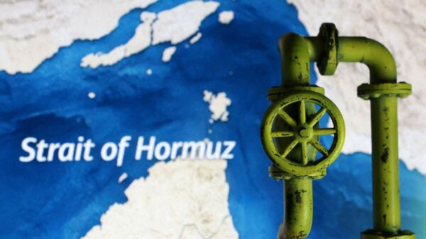 FILE PHOTO: A map showing the Strait of Hormuz and a 3D printed oil pipeline are seen in this illustration taken March 23, 2026. REUTERS/Dado Ruvic/Illustration/File Photo/File Photo/File Photo/File Photo