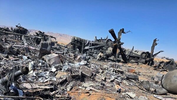 An image released on April 5, 2026, and obtained from social media appears to show wreckage of an American aircraft and a helicopter rotor in Isfahan, Iran, which forensic imagery analyst William Goodhind said is consistent with a U.S. MC‑130J or HC‑130J, amid the U.S.-Israeli conflict with Iran.