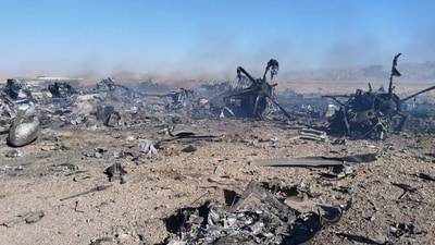 Wreckage is shown at what Iran's state TV claimed was the site of a downed American transport plane and two helicopters involved in a rescue operation, in Isfahan province, Iran, April 2026. (AP)