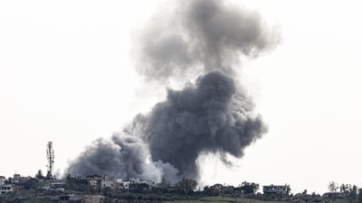 Smoke rises from targeted areas in the town of Arnoun, in Lebanon Nabatieh province following an airstrike, on April 26, 2026. (AFP)
