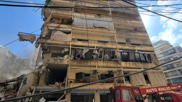 A picture shows a damaged building at the site of an Israeli airstrike that targeted Beirut's Ain al-Mreisseh neighbourhood on 8 April 2026. Israel launched a series of strikes in Beirut, causing panic among residents in the most violent attack on the capital since the start of the war with Hezbollah. Israel also hit Beirut's southern suburbs and southern Lebanon