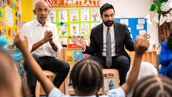 Former President Barack Obama and Mayor Zohran Mamdani sing 'Wheels on the Bus' to children at Learning Through Play Pre-K in the Bronx in New York
