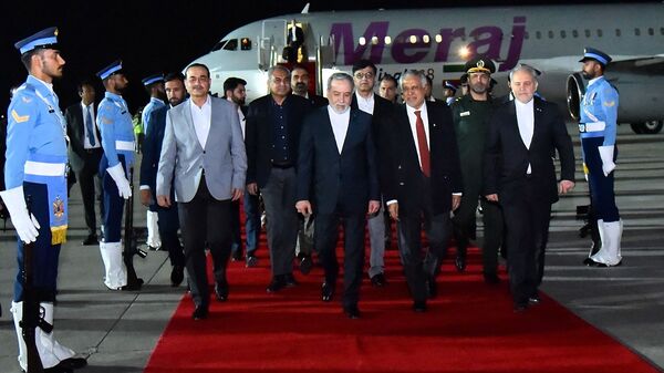 US Iran War LIVE: This handout photograph taken and released by Pakistan's Prime Minister Office on April 25, 2026 shows Pakistan's Foreign Minister Ishaq Dar (C-R) and Army Chief Syed Asim Munir (2ndL) walking with Iran's Foreign Minister Abbas Araghchi (C) upon his arrival at Nur Khan air base in Rawalpindi, near Islamabad. Abbas Araghchi arrived in Islamabad on April 24, Pakistan's foreign ministry said, ahead of planned Iran-US peace negotiations. (Photo by Aamir QURESHI / Pakistan's Prime Minister Office / AFP)