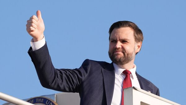 US Vice President JD Vance gives a thumb up sign as he boards Air Force Two after attending talks on Iran in Islamabad on April 12, 2026. Iran and the United States failed to reach an agreement to end the war in the Middle East, US Vice President JD Vance said April 12 after marathon talks in Islamabad, adding that he was leaving negotiations after giving Tehran the 'final and best offer'