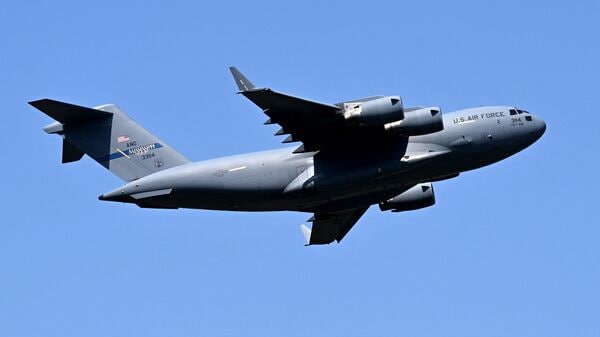 A US Air Force Boeing C-17 Globemaster III (Mississippi ANG) aircraft takes off from Pakistan's Nur Khan military airbase in Rawalpindi on April 20, 2026.(Photo by Farooq NAEEM / AFP)