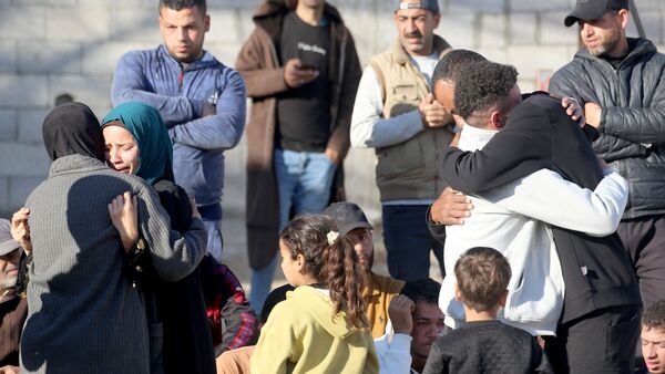 Family members and friends mourn outside the Nasser Hospital, the day after a Palestinian was killed in an Israeli strike in Khan Yunis, in the southern Gaza Strip on April 10, 2026. (Photo by AFP)