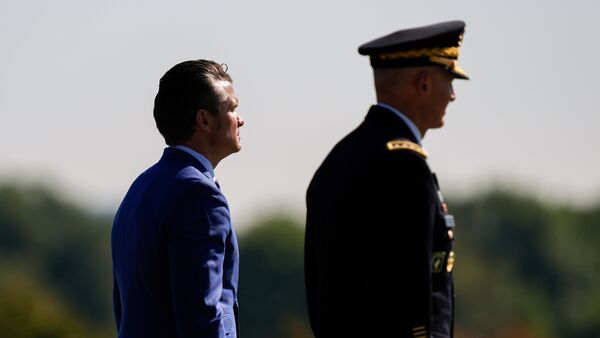 Defense Secretary Pete Hegseth, left, and Army Chief of Staff Gen. Randy George review troops during the POW/MIA National Recognition Day Ceremony at the Pentagon, Sept. 19, 2025, in Washington.