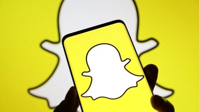 Snap announced that it would also shut more than 300 open roles. (REUTERS)