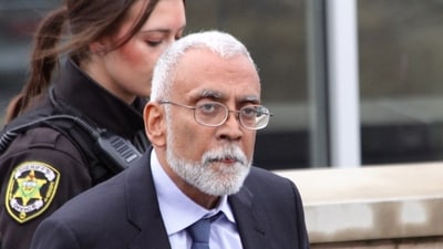 Subramanyam “Subu” Vedam walks outside the Centre County Courthouse in Bellefonte. (Geoff Rushton/StateCollege.com via AP)