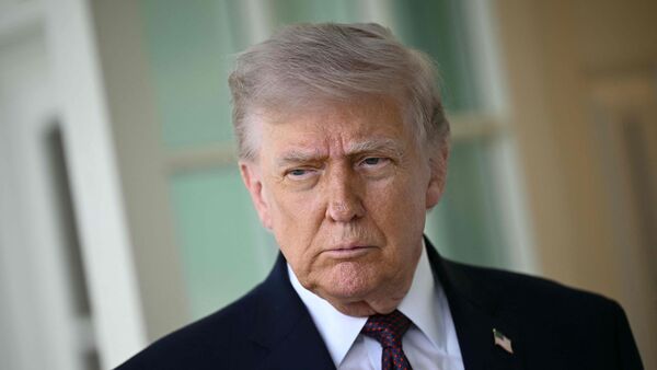 US President Donald Trump speaks to the press outside the Oval Office at the White House in Washington, DC, on April 13, 2026.