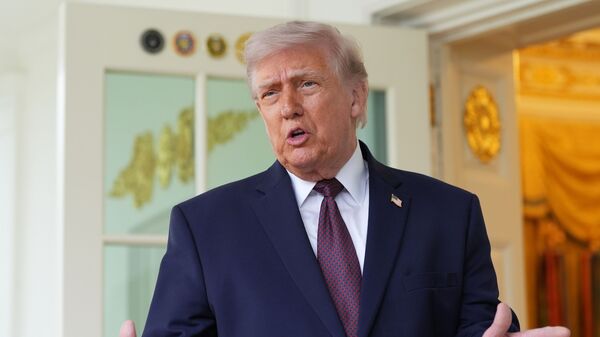 President Donald Trump speaks outside the Oval Office of the White House, Monday, April 13, 2026, in Washington. (AP Photo/Alex Brandon)
