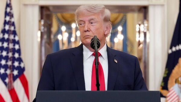 US President Donald Trump during a prime-time address to the nation in the Cross Hall of the White House in Washington, DC, US, on Wednesday, April 1, 2026.Photographer: Alex Brandon/AP Photo/Bloomberg