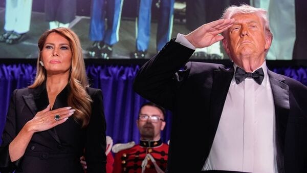 US First Lady Melania Trump, left, and President Donald Trump during the White House Correspondents' Association (WHCA) dinner in Washington, DC, US on Saturday, April 25, 2026. The annual dinner raises money for WHCA scholarships and honors the recipients of the organization's journalism awards.