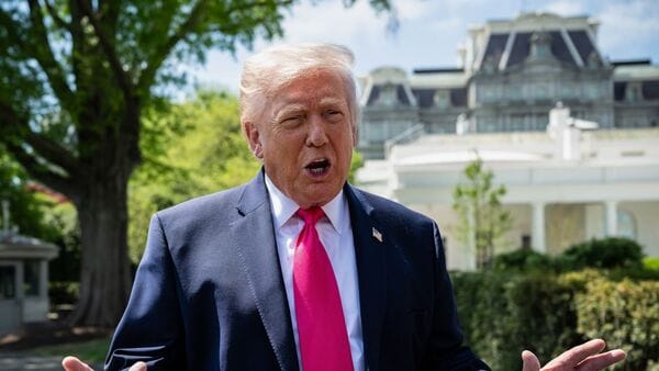 US President Donald Trump speaks to members of the media on the South Lawn of the White House before boarding Marine One in Washington, DC, US, on Thursday, April 16, 2026.