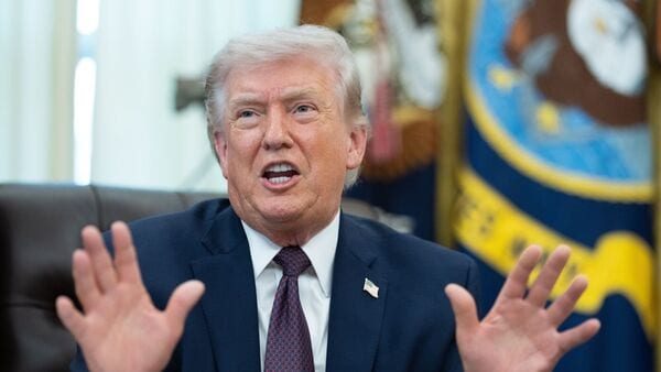 US President Donald Trump speaks during an executive order signing in the Oval Office of the White House in Washington, DC, US, on Tuesday, March 31, 2026. Trump signed an executive order Tuesday intended to make it harder for voters to cast mail-in ballots, escalating his long-running campaign against a practice used by millions of Americans. Photographer: Aaron Schwartz/CNP/Bloomberg
