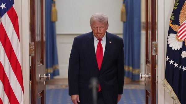 US President Donald Trump arrives to speak about the Iran war from the Cross Hall of the White House on Wednesday, April 1, 2026, in Washington.