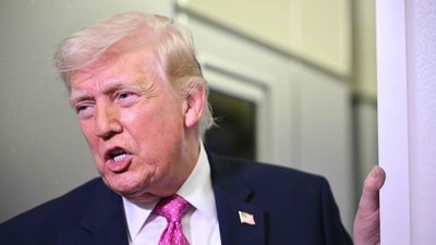 Donald Trump speaks to reporters aboard Air Force One en route to Joint Base Andrews, Maryland, on March 29, 2026. (AFP)