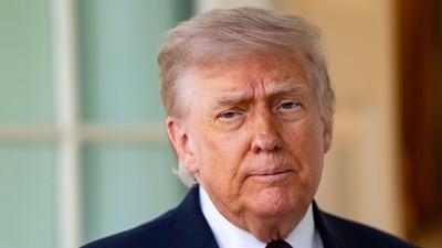 Donald Trump speaks to members of the media outside the Oval Office of the White House on April 13. (Bloomberg)