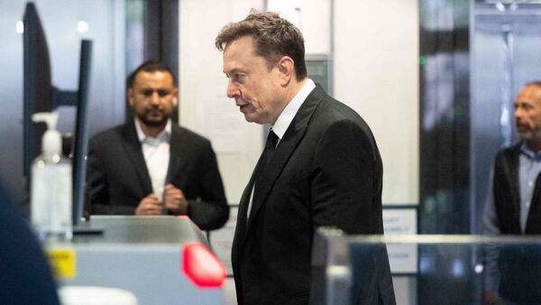 Elon Musk arrives to court at the Ronald V. Dellums Federal Building on April 30, 2026 in Oakland, California. Benjamin Fanjoy/Getty Images/AFP